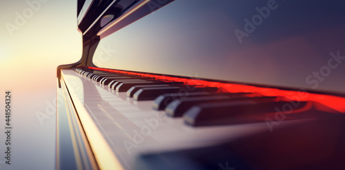 Leinwand Poster Grand piano keyboard on sunset sky