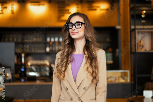 Business Woman Restaurant Owner Dressed Elegant Pantsuit Standing In Restaurant With Bar Counter Background