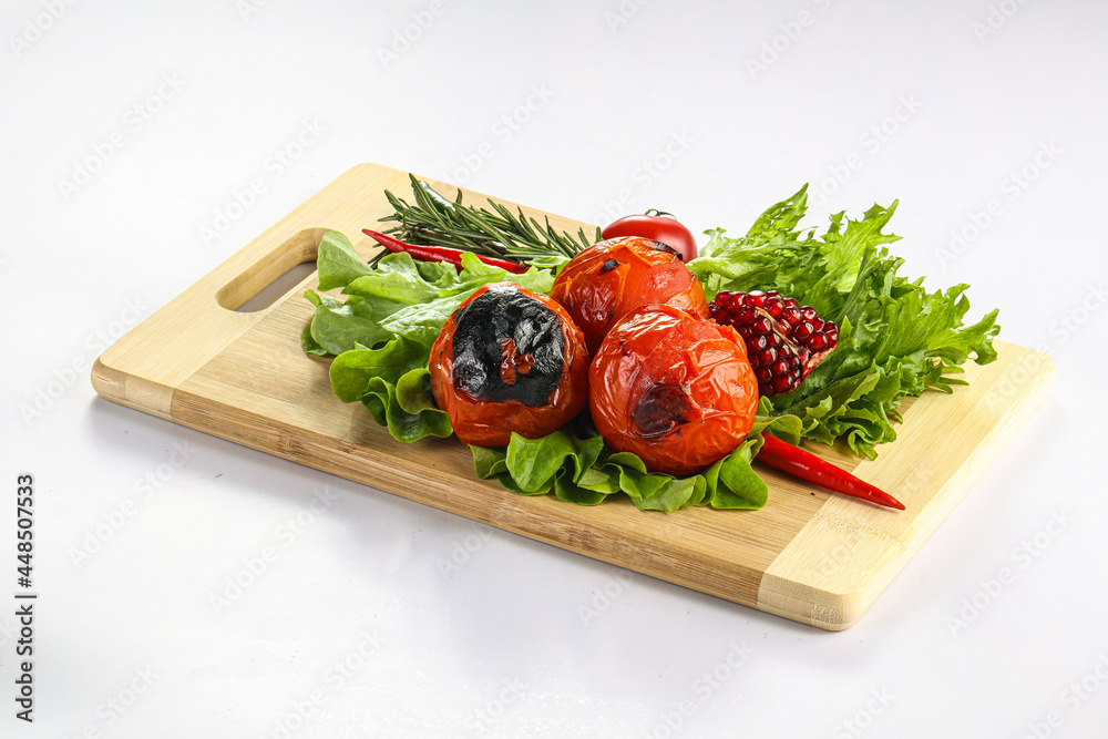 Grilled tomato bbq over board Grilled tomato bbq over board