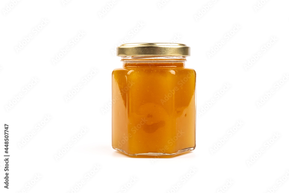 Glass jar full of sweet honey isolated on white background Glass jar full of sweet honey isolated on white background