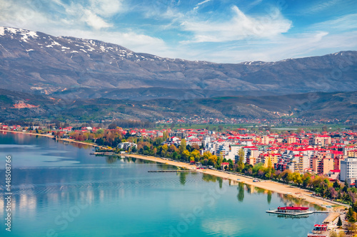Incredibl spring cityscape of Pogradec town. Wonderful outdoor scene of Ohrid lake. Spectacular morning view of Albania, Europe. Traveling concept background..