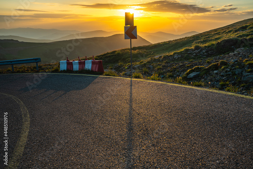 Sunrise over the famous national road 67C in Romania called Transalpina photo