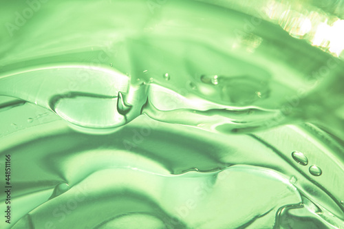Green water Aloe Vera gel smudged texture. Abstract clear cosmetic cream  face serum  moisturizer background