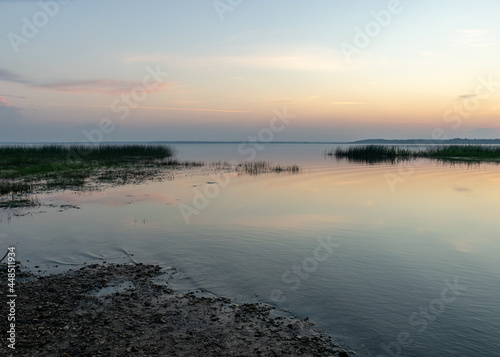 summer landscape on the shore of the lake at dawn, colors in the sky before sunrise, Lake Burtnieki, Latvia © ANDA