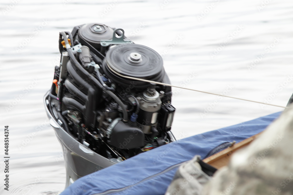 Start an outboard boat motor without the hood cap on the transom of the