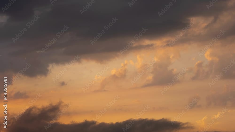 Great amazing cloudscape video background. 4k time lapse of scenic sun set time, cloudy landscape. Blue sky and colorful yellow, orange, purple evening clouds moving along during sunset Great amazing cloudscape video background. 4k time lapse of scenic sun set time, cloudy landscape. Blue sky and colorful yellow, orange, purple evening clouds moving along during sunset