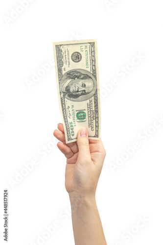 Hundred dollar in hand isolated on white background, woman hand with banknote, american money photo