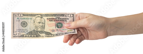 50 dollar in hand isolated on white background, woman hand with banknote, american money banner photo