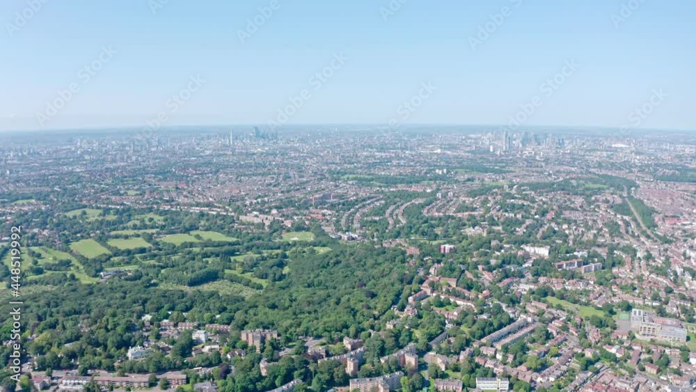 High drone shot over residential south London on a hot summer day High drone shot over residential south London on a hot summer day