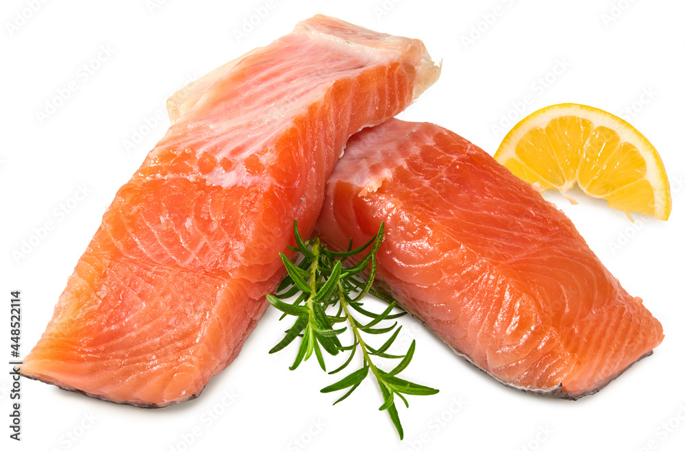 Red fish. Raw salmon fillet with rosemary and lemon isolate on white background. Clipping path and full depth of field