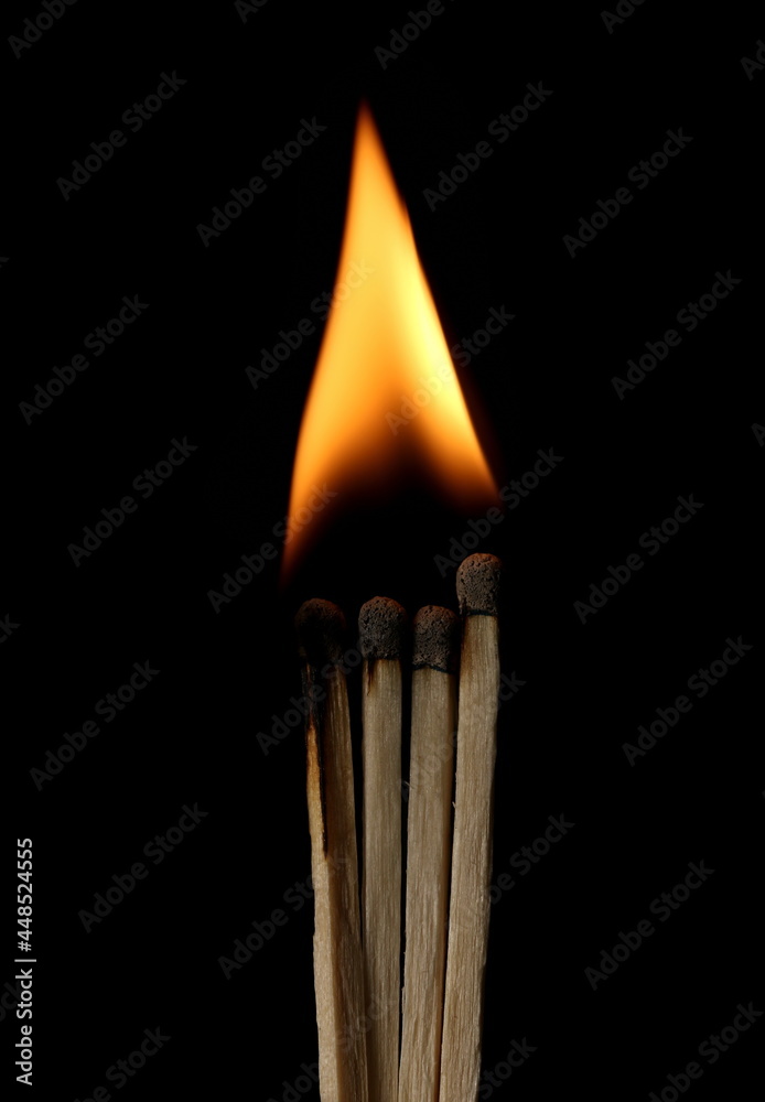 Ignited matchsticks burning bright flame, fire isolated on black background with clipping path Ignited matchsticks burning bright flame, fire isolated on black background with clipping path