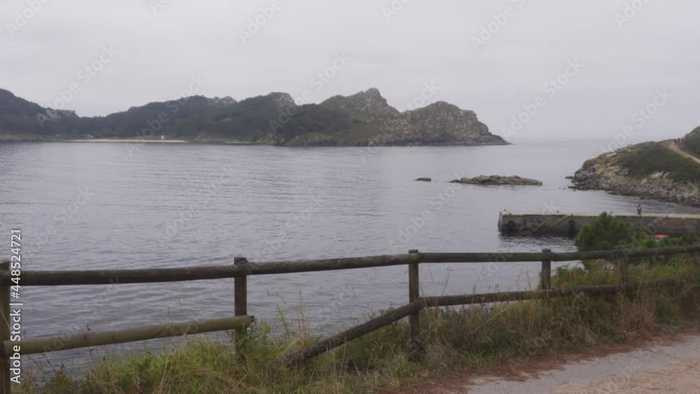 A Mysterious and Moody Uninhabited Island in the Cies Island Chain visible from Another Island's Hiking Path, Spain