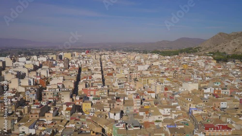 A landscape view with the city in Villena over The Atalaya Castle, province of Alicante, southern Spain, Located over a spur of the Sierra de la Villa. photo