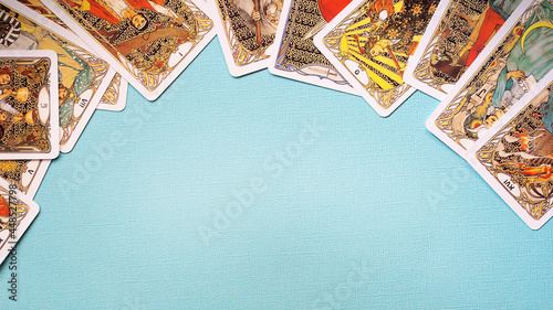 View of Golden tarot cards Frame on the Blue background, esoteric concept,