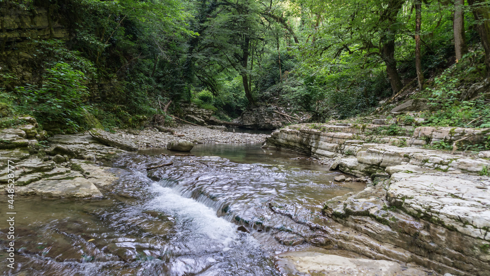 Beautiful forest and mountain river in Psakho canyon, Krasnodar Krai, Russia. Beautiful forest and mountain river in Psakho canyon, Krasnodar Krai, Russia.