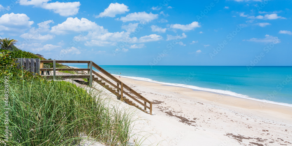 Wooden Boardwalk and Staircase Leading to Atlantic Ocean Beach Side View, Melbourne Beach, Florida, USA