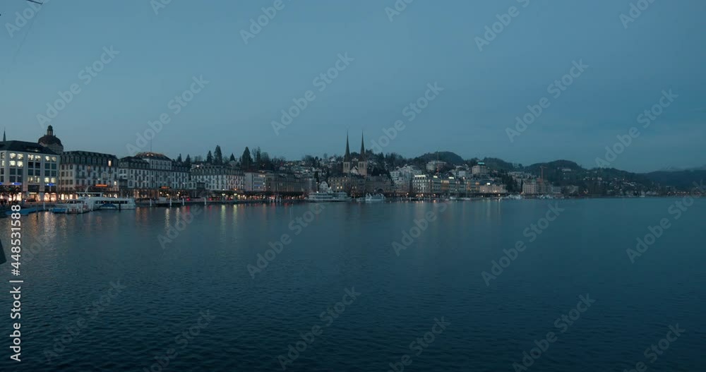 Lucerne, Switzerland - 03 03 2021: exterior view of the city and lake at sunset Lucerne, Switzerland - 03 03 2021: exterior view of the city and lake at sunset
