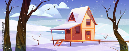 Wooden house in mountains at winter