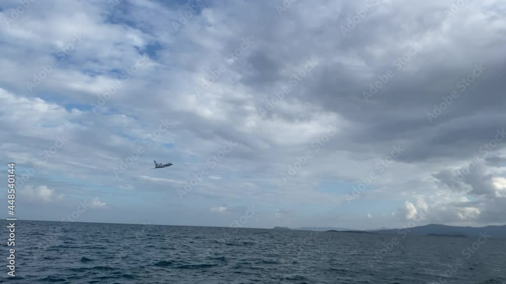 Private jet flying real low over the ocean Private jet flying real low over the ocean