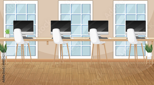 Office scene with many computers on the table