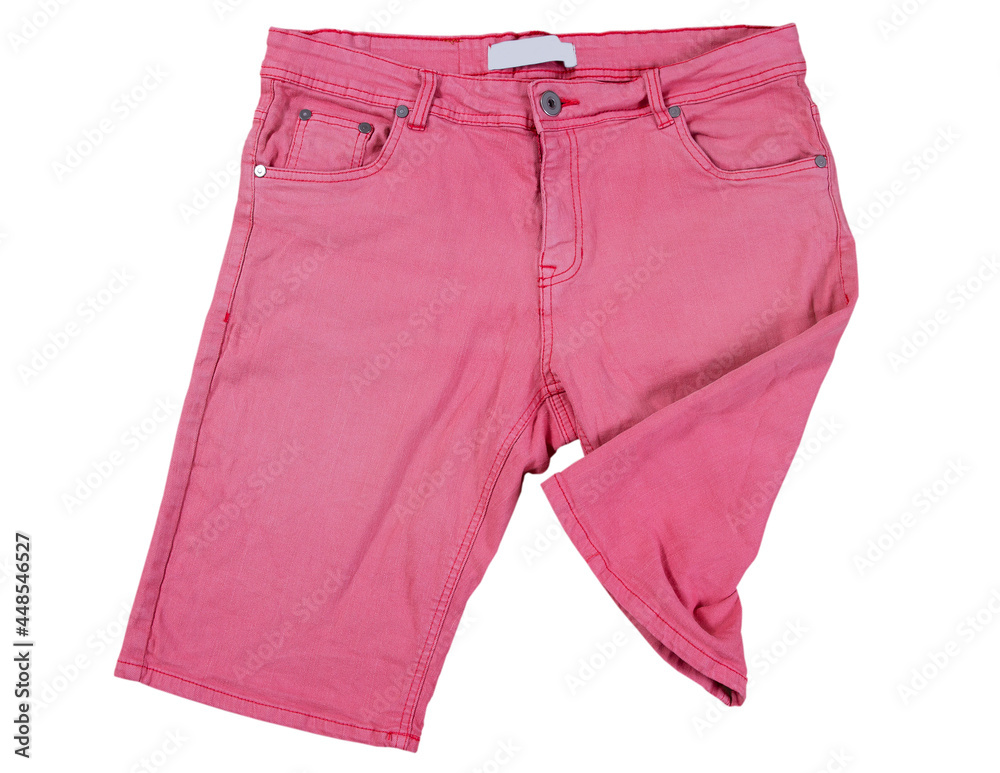 pink shorts on white background, Folded pink jeans shorts isolated over white pink shorts on white background, Folded pink jeans shorts isolated over white