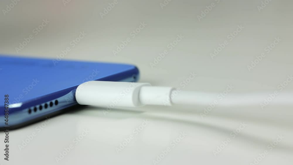 Close-up of the charging connection to your phone. Phone charging port. Charging your phone by wire. Close-up of the charging connection to your phone. Phone charging port. Charging your phone by wire.