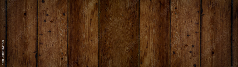 Naklejka premium Old brown rustic dark grunge wooden timber wall table texture - wood background banner panorama