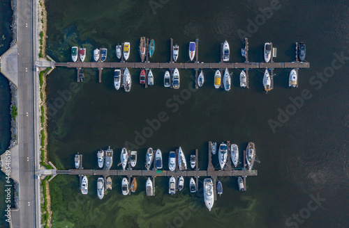 Tolyatti, Russia. Yacht Club Druzhba is located in the Komsomolsk District. View of the yachts and the pier from above, photo from a drone photo