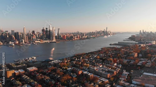 Manhattan skyline and Hudson River. Camera ascending.