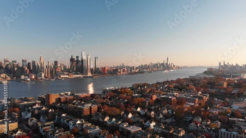 Manhattan skyline and Hudson River. Camera ascending.