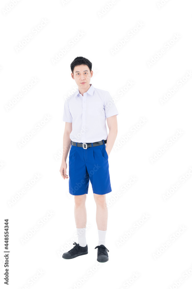 Student wearing high school uniforms of Thailand. Boy wears a school uniform in an isolated background.