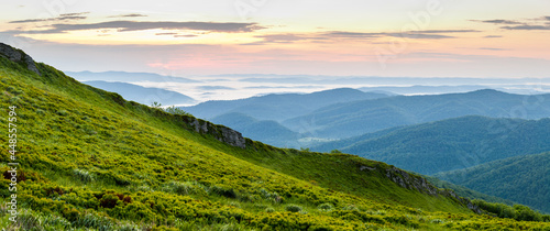 Fototapeta Naklejka Na Ścianę i Meble -  Sunrise seen from the summit of Połonina Wetlińska towards the Bieszczady peaks, Bieszczady forest, Bieszczady mountains, Carpathians