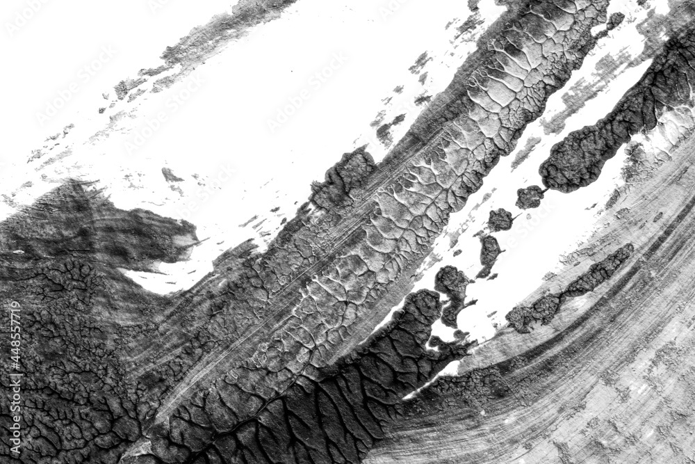 Obraz premium black white abstract acrylic painting color texture on white paper background by using rorschach inkblot method