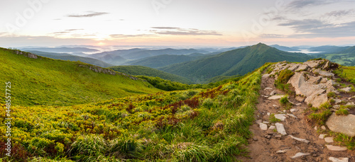 Fototapeta Naklejka Na Ścianę i Meble -  Sunrise seen from the summit of Połonina Wetlińska towards the Bieszczady peaks, Bieszczady forest, Bieszczady mountains, Carpathians