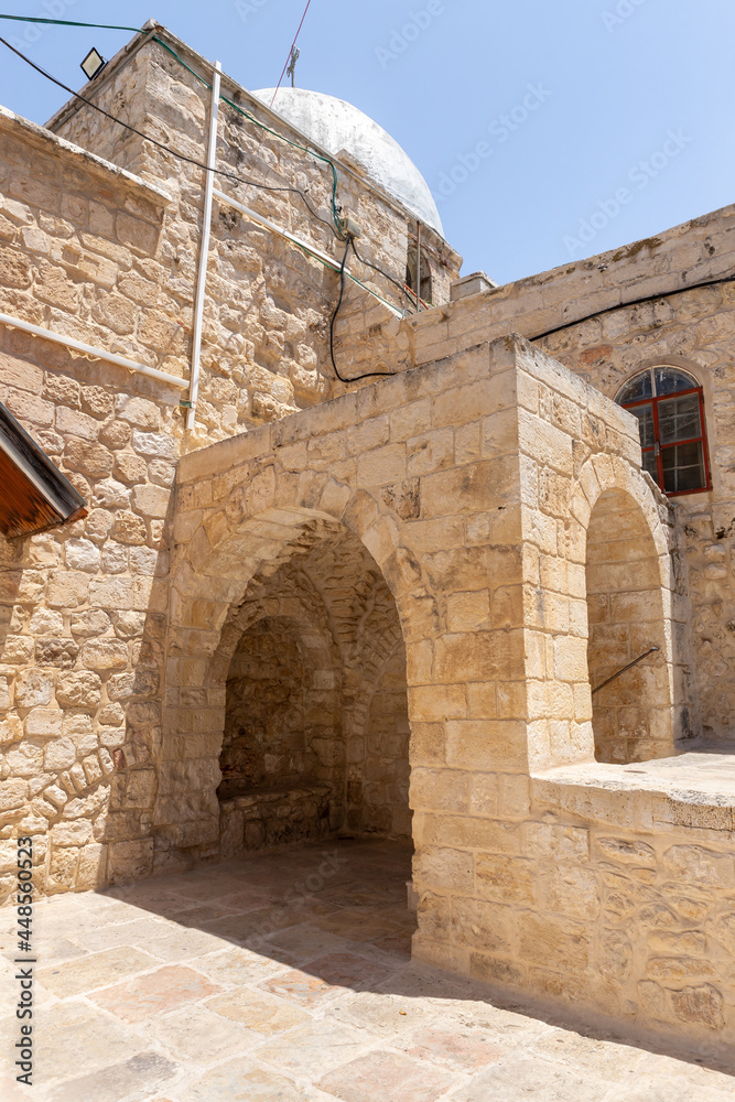 The courtyard of the monastery of the Archangel Michael in Christian quarters in the old city of Jerusalem, Israel The courtyard of the monastery of the Archangel Michael in Christian quarters in the old city of Jerusalem, Israel