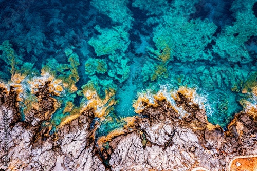 rocks and blue sea viewed from above on the mediterranean island of mallorca
