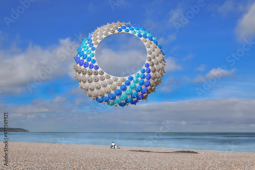 Blue air kite in the sky in Atlantic ocean