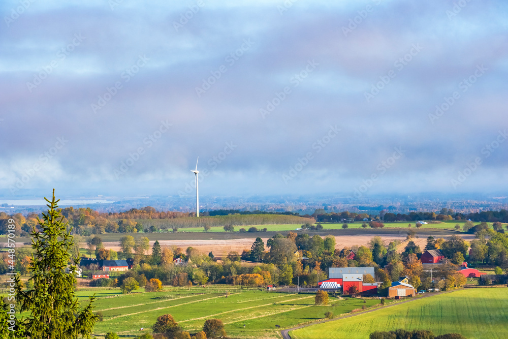 Countryside view with farms and fields in autumn