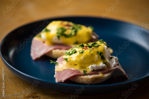 egg benedict with ham on muffins photo