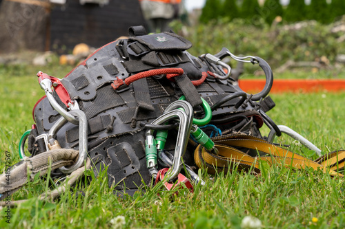 arborist climbing saddle dropped on the lawn