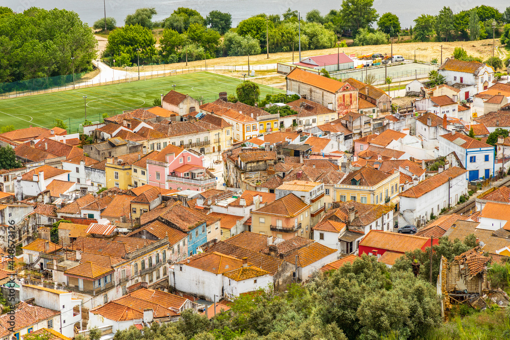 The architecture of Santarem surrounded by green fields and Tagus river, Portugal