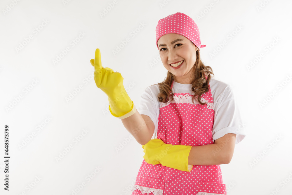Portrait of young maid wearing yellow grove on white background. Portrait of young maid wearing yellow grove on white background.