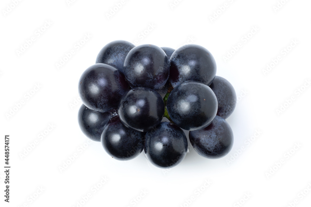Black grapes fruit isolated on white background.