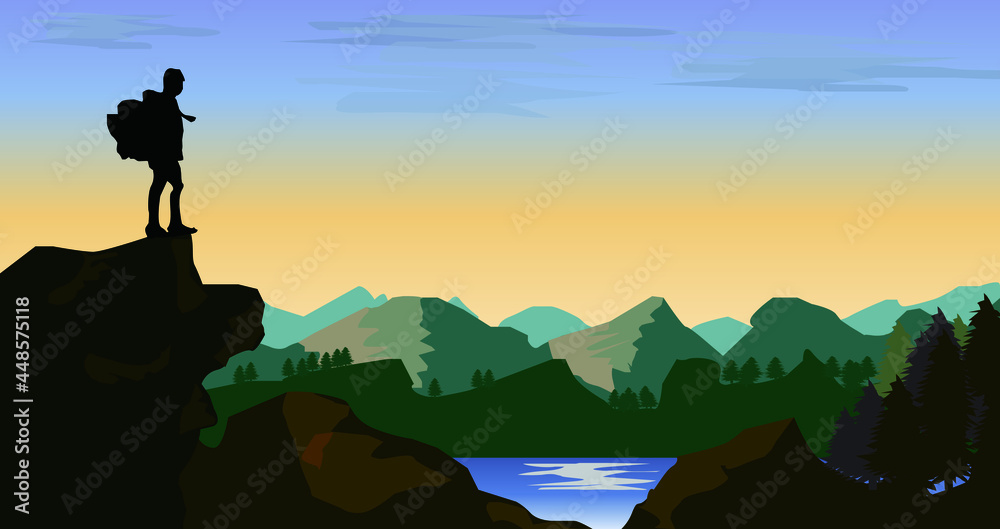 Silhouette of a person on a mountain top, hiker, standing and overlooking the nature scene