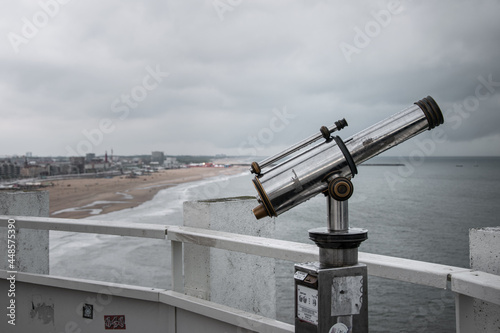 Coin operated telescope overlooking the coast at Scheveningen