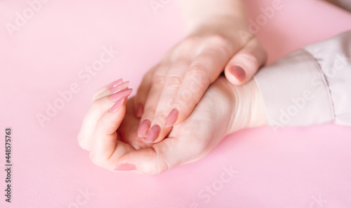 Beautiful female hands. Application Cream, Lotion. Spa and manicure concept. Soft skin, skin care concept. 