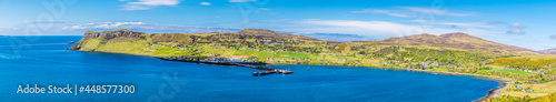 A panorama view over the ferry port and town of Uig on the Isle of Skye, Scotland on a summers day