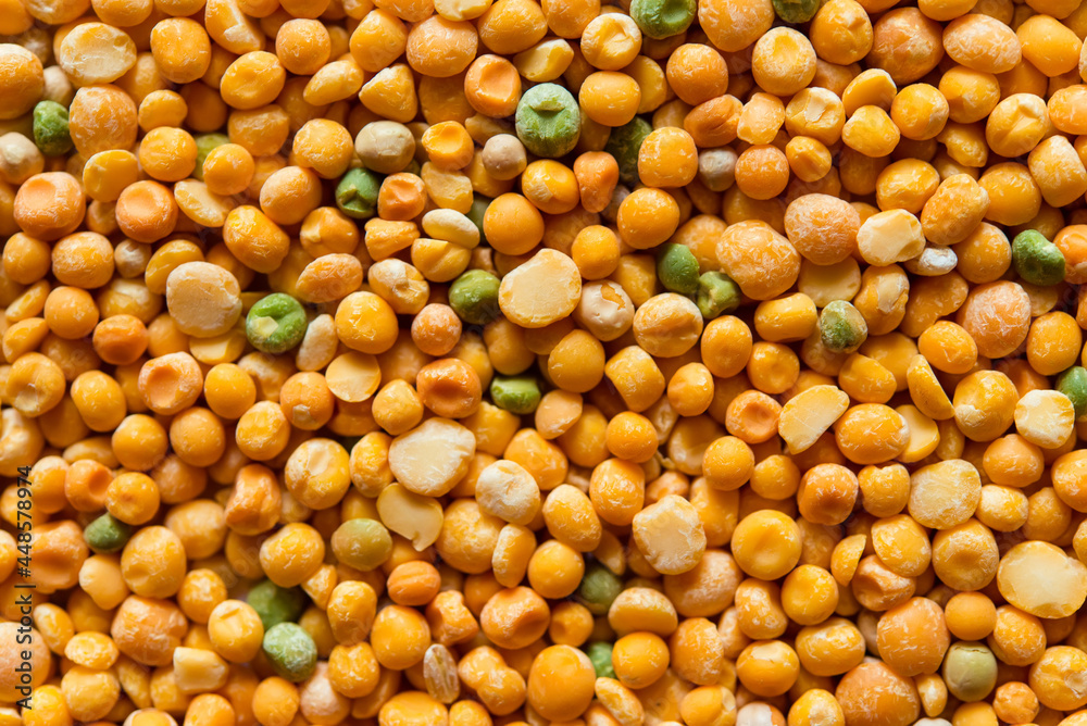 Dry split green and yellow peas texture background. Great for soups. Dry split green and yellow peas texture background. Great for soups.