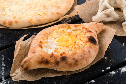 Georgian cuisine foodset from khachapuri and khinkali photo