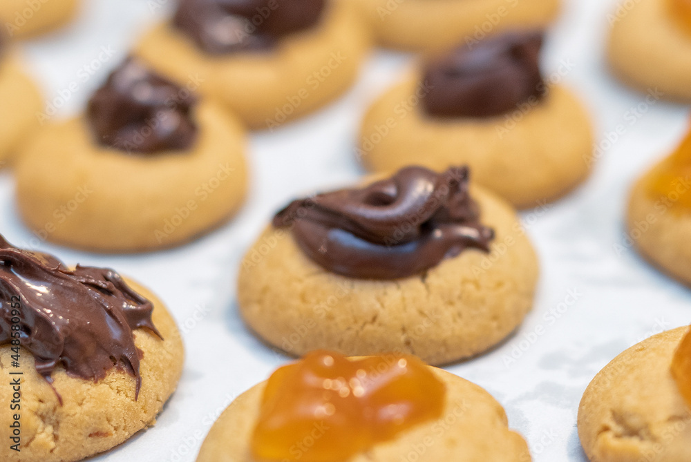 Cookies with jam and chocolate, close-up view